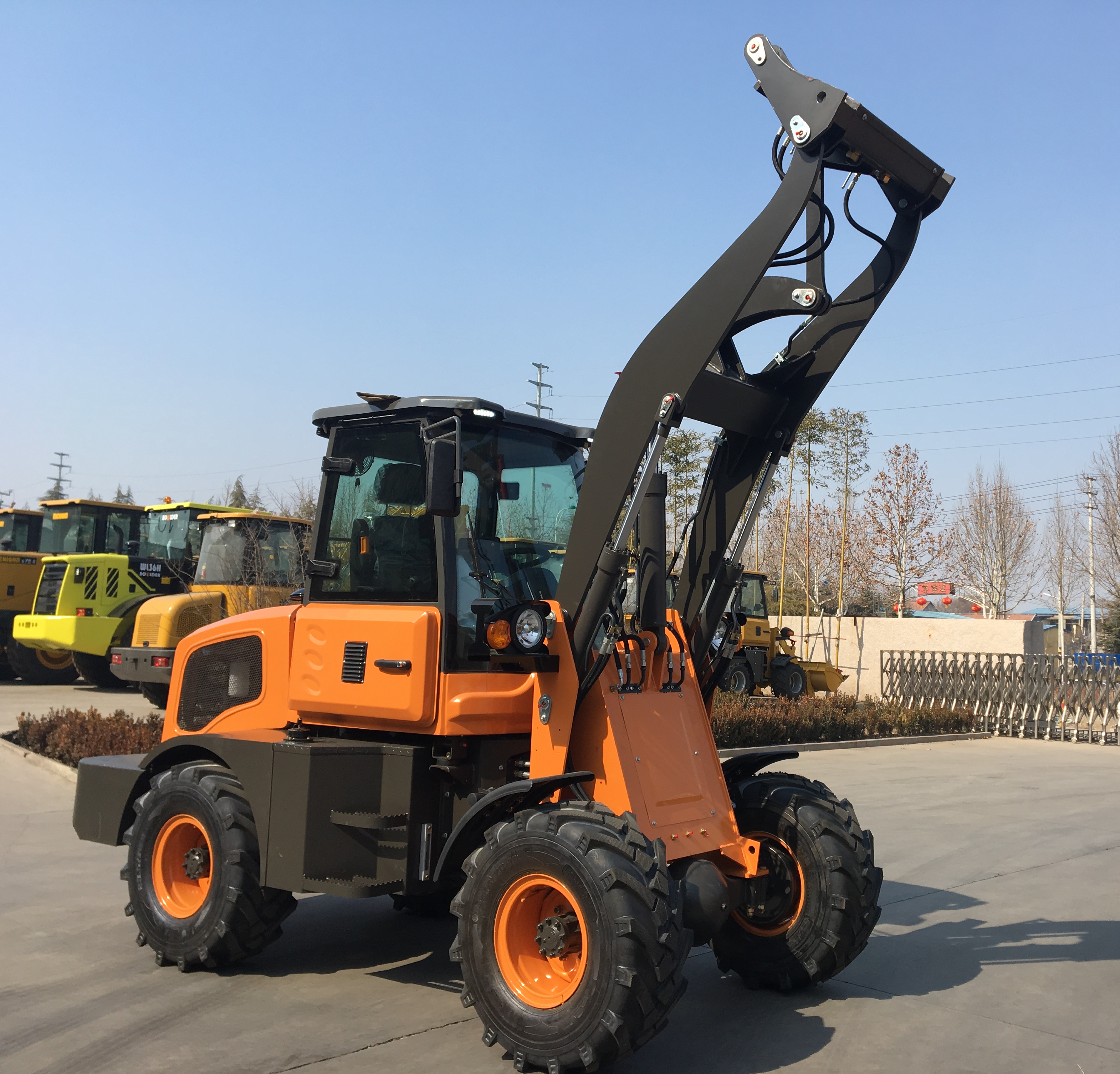 http://www.kanabau.de/Produktbilder/Baumaschinen/Radlader/KANA%20H15.5/1_orange.JPG